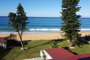 Direct Beachfront Sunrise Apartment - The Coachhouse
